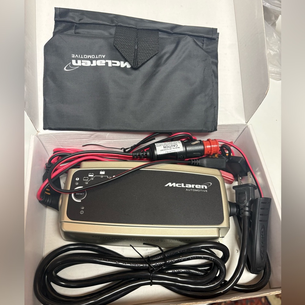 New never been used authentic 100% . Genuine McLaren Battery Charger